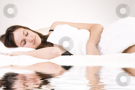 To use this stock image in your creative project, please select the size you need over to the right and click the "Add to Cart" button.
Your downloaded image will come with the Cutcaster watermark removed so don’t worry about the watermark you see on this page. Sleeping woman stock photo, Young adult woman in the studio on a bed by Frenk and Danielle Kaufmann