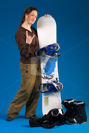 To use this stock image in your creative project, please select the size you need over to the right and click the "Add to Cart" button.
Your downloaded image will come with the Cutcaster watermark removed so don’t worry about the watermark you see on this page. Woman with long curly hair giving a hang loose stock photo, Portrait of a woman with long curly hair with snowboard making the hang loose sign by Frenk and Danielle Kaufmann