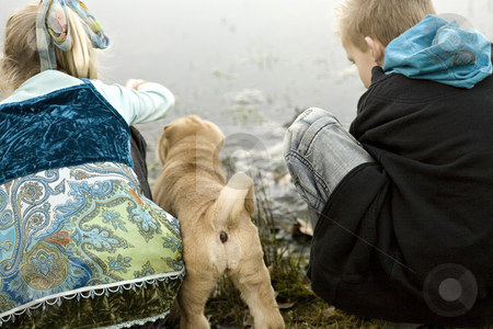 To use this stock image in your creative project, please select the size you need over to the right and click the "Add to Cart" button.
Your downloaded image will come with the Cutcaster watermark removed so don’t worry about the watermark you see on this page. Water play stock photo, Brother and sister playing at the lake while sharpei puppy is watching by Frenk and Danielle Kaufmann