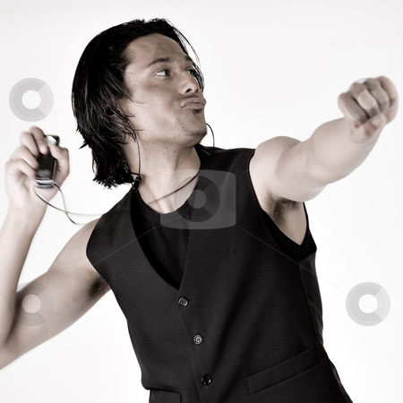 To use this stock image in your creative project, please select the size you need over to the right and click the "Add to Cart" button.
Your downloaded image will come with the Cutcaster watermark removed so don’t worry about the watermark you see on this page. Indonesian man with mp3 player stock photo, Dancing indonesian man with his mp3 player by Frenk and Danielle Kaufmann