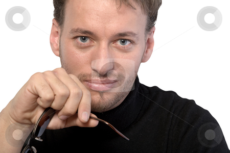 To use this stock image in your creative project, please select the size you need over to the right and click the "Add to Cart" button.
Your downloaded image will come with the Cutcaster watermark removed so don’t worry about the watermark you see on this page. Portrait of a young adult man stock photo, Studio portrait of a young adult man by Frenk and Danielle Kaufmann