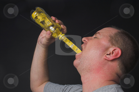 To use this stock image in your creative project, please select the size you need over to the right and click the "Add to Cart" button.
Your downloaded image will come with the Cutcaster watermark removed so don’t worry about the watermark you see on this page. Diet Drink stock photo, A man enjoying a beverage. Diet drink concept. by Robert Byron