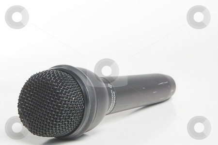 To use this stock image in your creative project, please select the size you need over to the right and click the "Add to Cart" button.
Your downloaded image will come with the Cutcaster watermark removed so don’t worry about the watermark you see on this page. Microphone stock photo, A modern wireless microphone used in the entertainment industry. by Robert Byron