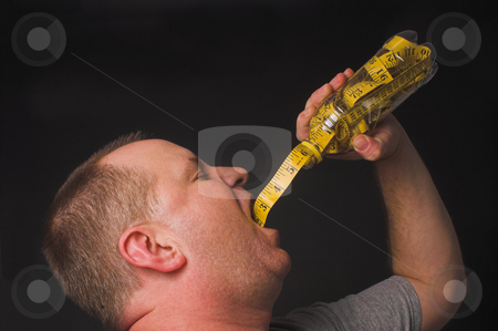 To use this stock image in your creative project, please select the size you need over to the right and click the "Add to Cart" button.
Your downloaded image will come with the Cutcaster watermark removed so don’t worry about the watermark you see on this page. Diet Drink stock photo, A man enjoying a beverage. Diet drink concept. by Robert Byron
