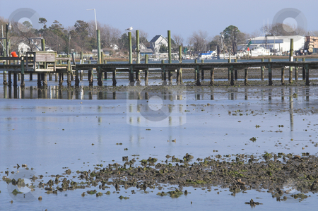 To use this stock image in your creative project, please select the size you need over to the right and click the "Add to Cart" button.
Your downloaded image will come with the Cutcaster watermark removed so don’t worry about the watermark you see on this page. Ocean Pier stock photo, A fishing and boat pier at the ocean. by Robert Byron