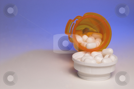 To use this stock image in your creative project, please select the size you need over to the right and click the "Add to Cart" button.
Your downloaded image will come with the Cutcaster watermark removed so don’t worry about the watermark you see on this page. Prescription Medication stock photo, Prescription pills in a plastic medicine bottle. by Robert Byron