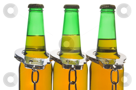 To use this stock image in your creative project, please select the size you need over to the right and click the "Add to Cart" button.
Your downloaded image will come with the Cutcaster watermark removed so don’t worry about the watermark you see on this page. Beer and Handcuffs - Drunk Driving Concept stock photo, Drunk driving concept - bottled beer and handcuffs. by Robert Byron