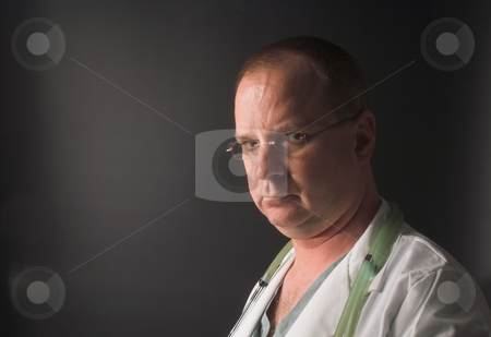 To use this stock image in your creative project, please select the size you need over to the right and click the "Add to Cart" button.
Your downloaded image will come with the Cutcaster watermark removed so don’t worry about the watermark you see on this page. Doctor stock photo, A medical doctor waiting on his next patient. by Robert Byron