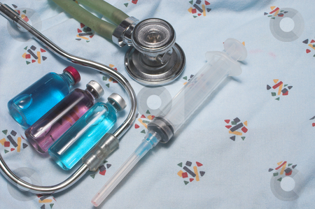 To use this stock image in your creative project, please select the size you need over to the right and click the "Add to Cart" button.
Your downloaded image will come with the Cutcaster watermark removed so don’t worry about the watermark you see on this page. Medical Supplies stock photo, Medical gown, syringe, vials and stethoscope. by Robert Byron
