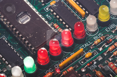 To use this stock image in your creative project, please select the size you need over to the right and click the "Add to Cart" button.
Your downloaded image will come with the Cutcaster watermark removed so don’t worry about the watermark you see on this page. LED's on a Circuit Board stock photo, A set of LED's on a circuit board. by Robert Byron