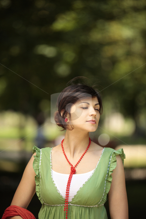 To use this stock image in your creative project, please select the size you need over to the right and click the "Add to Cart" button.
Your downloaded image will come with the Cutcaster watermark removed so don’t worry about the watermark you see on this page. Brunette woman with eyes closed stock photo, Young lady in nature with her eyes closed and a peaceful face by Claudia Veja