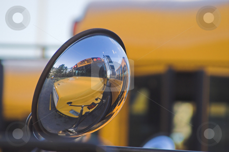 To use this stock image in your creative project, please select the size you need over to the right and click the "Add to Cart" button.
Your downloaded image will come with the Cutcaster watermark removed so don’t worry about the watermark you see on this page. School Bus stock photo, The reflection of a school bus in a bus mirror. by Robert Byron