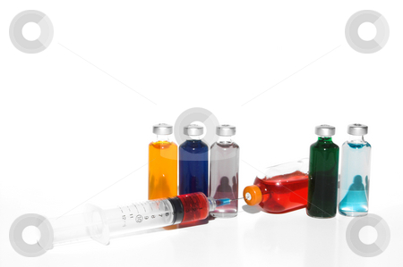 To use this stock image in your creative project, please select the size you need over to the right and click the "Add to Cart" button.
Your downloaded image will come with the Cutcaster watermark removed so don’t worry about the watermark you see on this page. Syringe and Medication stock photo, Prescription medicine vials and a syringe. by Robert Byron