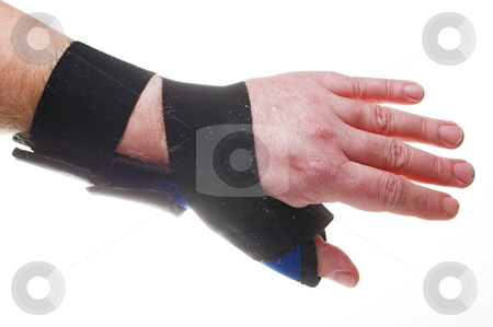 To use this stock image in your creative project, please select the size you need over to the right and click the "Add to Cart" button.
Your downloaded image will come with the Cutcaster watermark removed so don’t worry about the watermark you see on this page. Wrist Brace stock photo, A stiff fabric brace for broken or sprained wrists. by Robert Byron