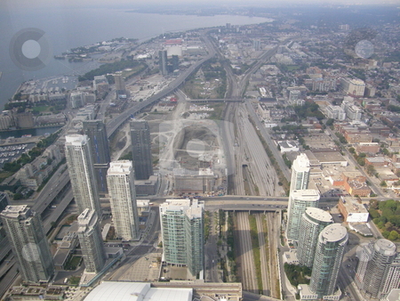 To use this stock image in your creative project, please select the size you need over to the right and click the "Add to Cart" button.
Your downloaded image will come with the Cutcaster watermark removed so don’t worry about the watermark you see on this page. Toronto, Canada stock photo, Aerial View of Toronto, Canada by Ritu Jethani