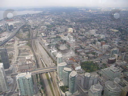 To use this stock image in your creative project, please select the size you need over to the right and click the "Add to Cart" button.
Your downloaded image will come with the Cutcaster watermark removed so don’t worry about the watermark you see on this page. Toronto, Canada stock photo, Aerial View of Toronto, Canada by Ritu Jethani