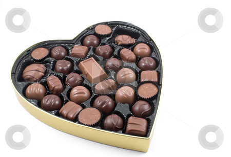 To use this stock image in your creative project, please select the size you need over to the right and click the "Add to Cart" button.
Your downloaded image will come with the Cutcaster watermark removed so don’t worry about the watermark you see on this page. Valentines Candy stock photo, A large box of chocolate Valentines candy. by Robert Byron