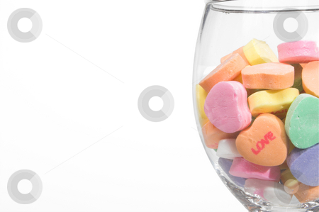 To use this stock image in your creative project, please select the size you need over to the right and click the "Add to Cart" button.
Your downloaded image will come with the Cutcaster watermark removed so don’t worry about the watermark you see on this page. Conversation Hearts in a Wine Glass stock photo, Conversation hearts in a wine glass. Concept of love. by Robert Byron