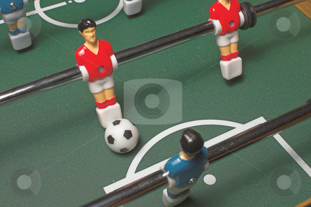 To use this stock image in your creative project, please select the size you need over to the right and click the "Add to Cart" button.
Your downloaded image will come with the Cutcaster watermark removed so don’t worry about the watermark you see on this page. Foosball Game stock photo, A miniature tabletop foosball arcade type game. by Robert Byron