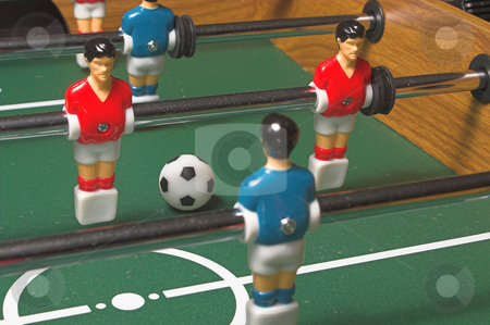 To use this stock image in your creative project, please select the size you need over to the right and click the "Add to Cart" button.
Your downloaded image will come with the Cutcaster watermark removed so don’t worry about the watermark you see on this page. Foosball Game stock photo, A miniature tabletop foosball arcade type game. by Robert Byron