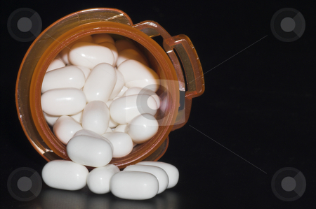 To use this stock image in your creative project, please select the size you need over to the right and click the "Add to Cart" button.
Your downloaded image will come with the Cutcaster watermark removed so don’t worry about the watermark you see on this page. Prescription Medication stock photo, Prescription pills in a plastic medicine bottle. by Robert Byron