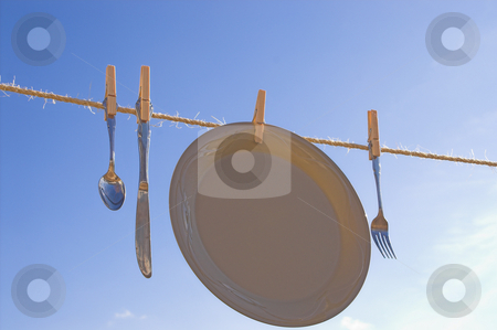 To use this stock image in your creative project, please select the size you need over to the right and click the "Add to Cart" button.
Your downloaded image will come with the Cutcaster watermark removed so don’t worry about the watermark you see on this page. Drying Dishes stock photo, Dishes hung out to dry on a clothesline. by Robert Byron
