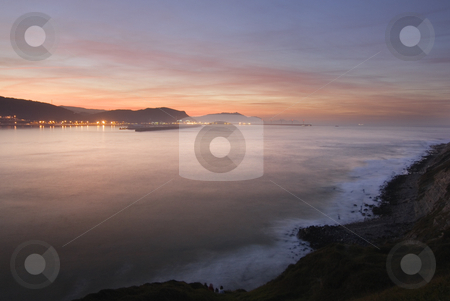 To use this stock image in your creative project, please select the size you need over to the right and click the "Add to Cart" button.
Your downloaded image will come with the Cutcaster watermark removed so don’t worry about the watermark you see on this page. Shore stock photo, Calm image of the rocks in the sea shore by Ivan Montero