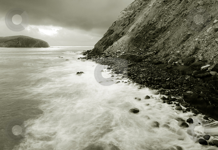 To use this stock image in your creative project, please select the size you need over to the right and click the "Add to Cart" button.
Your downloaded image will come with the Cutcaster watermark removed so don’t worry about the watermark you see on this page. Shore stock photo, Calm image of the rocks in the sea shore by Ivan Montero