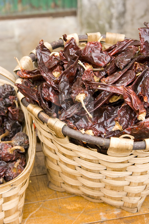 To use this stock image in your creative project, please select the size you need over to the right and click the "Add to Cart" button.
Your downloaded image will come with the Cutcaster watermark removed so don’t worry about the watermark you see on this page. Red hot chilli peppers in a basket stock photo, A basket full of red hot chilli peppers food natural by Ivan Montero
