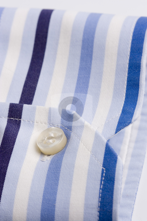 To use this stock image in your creative project, please select the size you need over to the right and click the "Add to Cart" button.
Your downloaded image will come with the Cutcaster watermark removed so don’t worry about the watermark you see on this page. Men shirt stock photo, Clothes business man shirt blue and white stripes by Ivan Montero