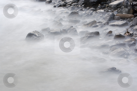 To use this stock image in your creative project, please select the size you need over to the right and click the "Add to Cart" button.
Your downloaded image will come with the Cutcaster watermark removed so don’t worry about the watermark you see on this page. Shore stock photo, Calm image of the rocks in the sea shore by Ivan Montero