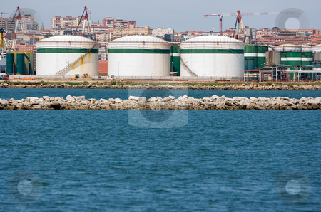 To use this stock image in your creative project, please select the size you need over to the right and click the "Add to Cart" button.
Your downloaded image will come with the Cutcaster watermark removed so don’t worry about the watermark you see on this page. Industry business petrol refinery stock photo, Industry business petrol refinery near the sea by Ivan Montero