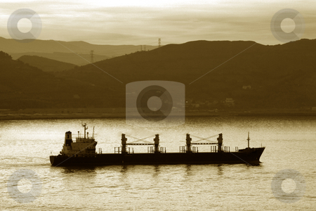 To use this stock image in your creative project, please select the size you need over to the right and click the "Add to Cart" button.
Your downloaded image will come with the Cutcaster watermark removed so don’t worry about the watermark you see on this page. Boat stock photo, Image of a transportation ship leaving the harbour by Ivan Montero