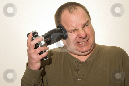 To use this stock image in your creative project, please select the size you need over to the right and click the "Add to Cart" button.
Your downloaded image will come with the Cutcaster watermark removed so don’t worry about the watermark you see on this page. Suicidal Photographer stock photo, A photographer shooting his own head off. by Robert Byron