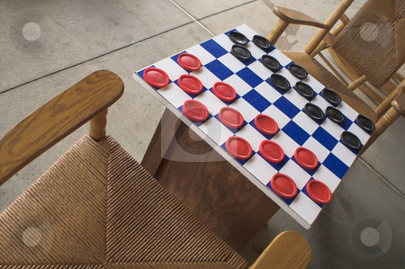 To use this stock image in your creative project, please select the size you need over to the right and click the "Add to Cart" button.
Your downloaded image will come with the Cutcaster watermark removed so don’t worry about the watermark you see on this page. Checkers Game stock photo, A checkers board set up and ready to play. by Robert Byron