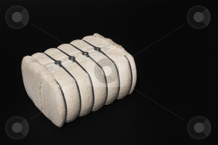 To use this stock image in your creative project, please select the size you need over to the right and click the "Add to Cart" button.
Your downloaded image will come with the Cutcaster watermark removed so don’t worry about the watermark you see on this page. Cotton Bale stock photo, A bale of raw cotton used to make textile products. by Robert Byron