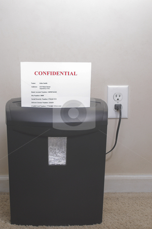 To use this stock image in your creative project, please select the size you need over to the right and click the "Add to Cart" button.
Your downloaded image will come with the Cutcaster watermark removed so don’t worry about the watermark you see on this page. Shredder - Identity Theft Concept stock photo, A shredder with confidential information - Identity theft concept. by Robert Byron