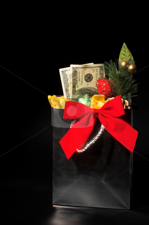 To use this stock image in your creative project, please select the size you need over to the right and click the "Add to Cart" button.
Your downloaded image will come with the Cutcaster watermark removed so don’t worry about the watermark you see on this page. Christmas or Birthday Present stock photo, A Christmas or birthday present of cash. by Robert Byron