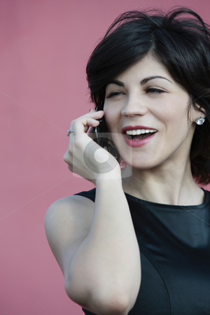 To use this stock image in your creative project, please select the size you need over to the right and click the "Add to Cart" button.
Your downloaded image will come with the Cutcaster watermark removed so don’t worry about the watermark you see on this page. Buniness woman talking on cell stock photo, Close up of young attractive happy business lady talking on the phone laughing by Claudia Veja