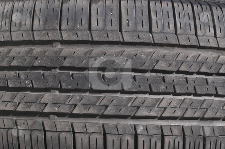To use this stock image in your creative project, please select the size you need over to the right and click the "Add to Cart" button.
Your downloaded image will come with the Cutcaster watermark removed so don’t worry about the watermark you see on this page. Car Tire stock photo, A close-up image of an automobile tire. by Robert Byron