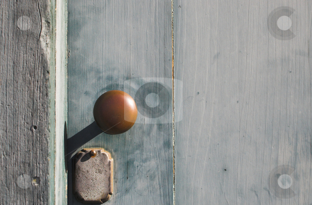 To use this stock image in your creative project, please select the size you need over to the right and click the "Add to Cart" button.
Your downloaded image will come with the Cutcaster watermark removed so don’t worry about the watermark you see on this page. Antique Doorknob stock photo, An antique doorknob on an antique door of a historic building. by Robert Byron