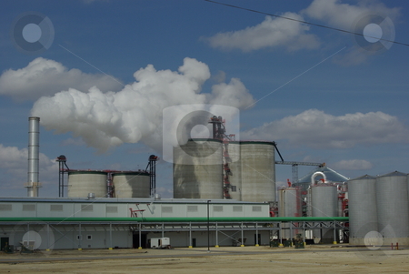 To use this stock image in your creative project, please select the size you need over to the right and click the "Add to Cart" button.
Your downloaded image will come with the Cutcaster watermark removed so don’t worry about the watermark you see on this page. Iowa Biofuels Plant stock photo, Iowa leads the nation in the number of biofuel production facilities making ethanol from corn with 25 now in operation. Seventeen more plants are under construction or in planning stages. This ethonal plant is located in northeast Iowa on the edge of rural Fairbank (04/02/2008). by Dennis Thomsen