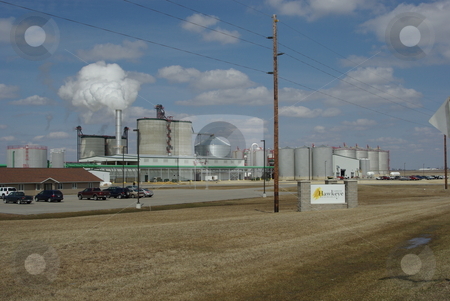 To use this stock image in your creative project, please select the size you need over to the right and click the "Add to Cart" button.
Your downloaded image will come with the Cutcaster watermark removed so don’t worry about the watermark you see on this page. Northeast Iowa biofuels plant stock photo, Iowa leads the nation in the number of biofuel production facilities making ethanol from corn with 25 now in operation. Seventeen more plants are under construction or planning stages. This ethonal plant is located in northeast Iowa on the edge of rural Fairbank (04/02/2008). by Dennis Thomsen