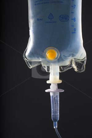To use this stock image in your creative project, please select the size you need over to the right and click the "Add to Cart" button.
Your downloaded image will come with the Cutcaster watermark removed so don’t worry about the watermark you see on this page. Saline Drip stock photo, A close-up view of a medical saline solution drip. by Robert Byron