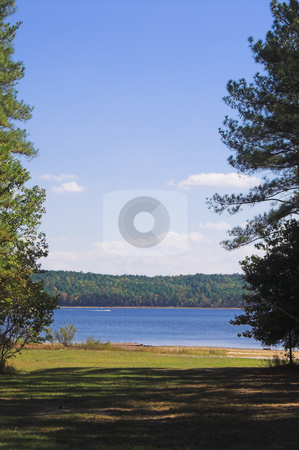 To use this stock image in your creative project, please select the size you need over to the right and click the "Add to Cart" button.
Your downloaded image will come with the Cutcaster watermark removed so don’t worry about the watermark you see on this page. Peaceful Lake stock photo, A peaceful lake on a summer afternoon. by Robert Byron