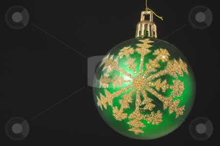 To use this stock image in your creative project, please select the size you need over to the right and click the "Add to Cart" button.
Your downloaded image will come with the Cutcaster watermark removed so don’t worry about the watermark you see on this page. Christmas Ornament stock photo, A very colorful Christmas ornamental glass ball. by Robert Byron