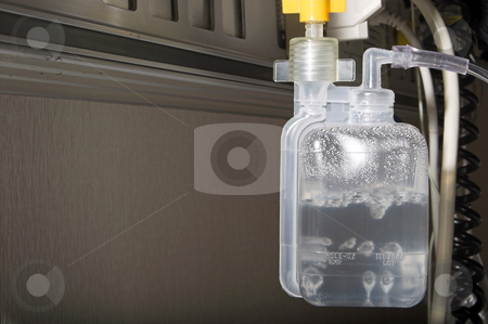 To use this stock image in your creative project, please select the size you need over to the right and click the "Add to Cart" button.
Your downloaded image will come with the Cutcaster watermark removed so don’t worry about the watermark you see on this page. Oxygen Humidifyer stock photo, Dedicated hospital oxygen with an attached humidity unit. by Robert Byron
