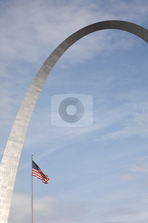 To use this stock image in your creative project, please select the size you need over to the right and click the "Add to Cart" button.
Your downloaded image will come with the Cutcaster watermark removed so don’t worry about the watermark you see on this page. St. Louis arch and US Flag stock photo, An interesting view of the St. Louis Arch - Gateway to the West - the Jefferson National Expansion Memorial (U.S. National Park Service) by Mitch Aunger