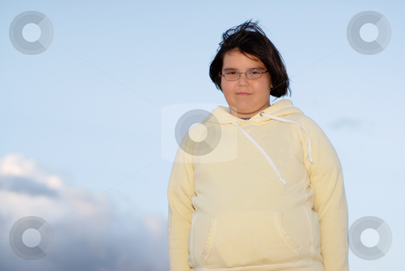 To use this stock image in your creative project, please select the size you need over to the right and click the "Add to Cart" button.
Your downloaded image will come with the Cutcaster watermark removed so don’t worry about the watermark you see on this page. Girl with sky background stock photo, Low angle view of a young girl standing against the sky representing success by Richard Nelson