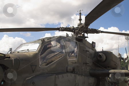 To use this stock image in your creative project, please select the size you need over to the right and click the "Add to Cart" button.
Your downloaded image will come with the Cutcaster watermark removed so don’t worry about the watermark you see on this page. Helicopter Rotor stock photo, A close up of the main rotor of a helicopter. by Robert Byron